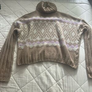 soft fabric turtleneck sweater. slightly worn